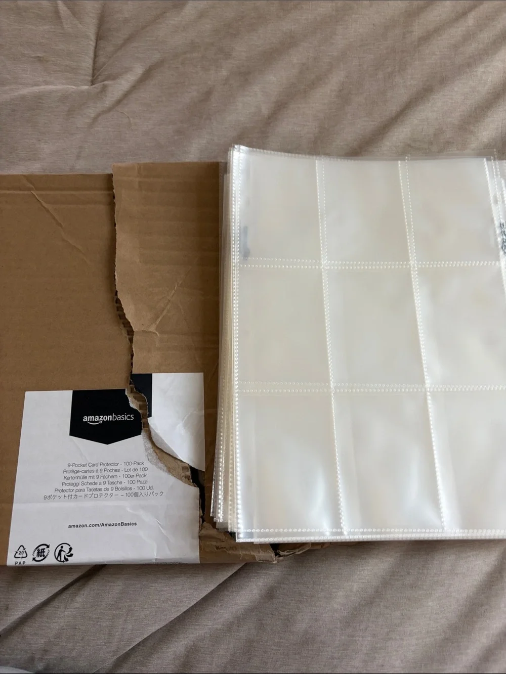 AmazonBasics 9-Pocket Card Protector Pages - White/Clear 75 sleeves left of pack